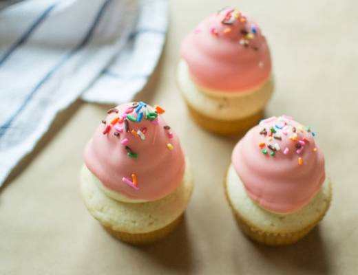 colored chocolate dipped cupcakes